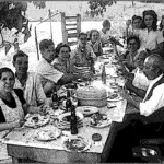 Extended family dinner from days gone bye, no children at the adult table.