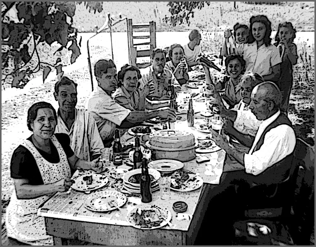 Extended family dinner from days gone bye, no children at the adult table.